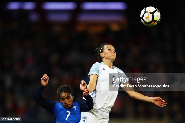 Lucy Bronze of England battles for the ball with Amel Majri of France during the International friendly match between France and Women held at Stade...