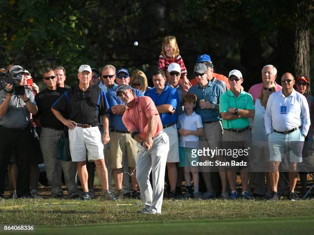 Scott McCarron plays a chip shot onthe 18th hole during the first round of the PGA TOUR Champions Dominion Energy Charity Classic at The Country Club...