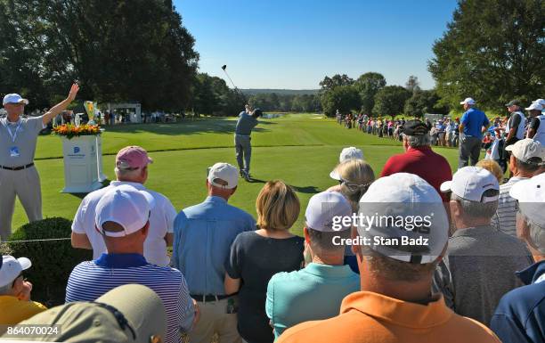 Fred Funk plays a tee shot on the first hole during the first round of the PGA TOUR Champions Dominion Energy Charity Classic at The Country Club of...