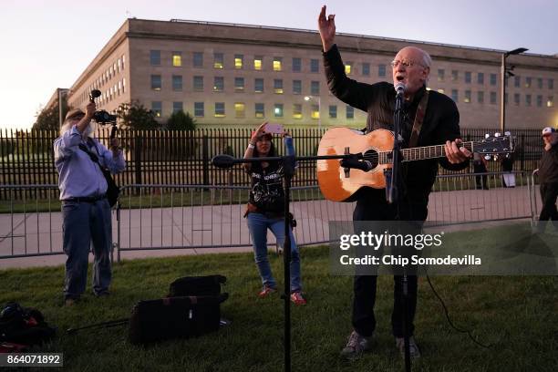 Peter Yarrow, founding member of the legendary folk group Peter, Paul and Mary, sings and speaks about the 1967 March on the Pentagon during a vigil...