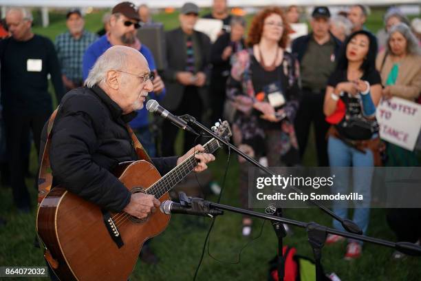 Peter Yarrow, founding member of the legendary folk group Peter, Paul and Mary, sings and speaks about the 1967 March on the Pentagon during a vigil...