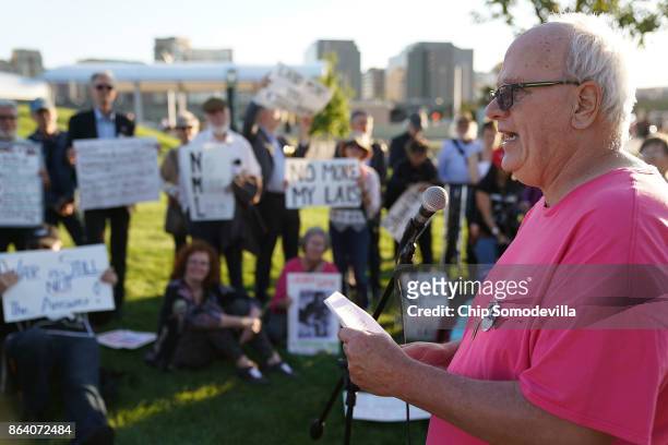 Anti-war activist Bruce Beyer speaks during a vigil commeorating the 50th anniversary of the 1967 March on the Pentagon outside the Pentagon October...