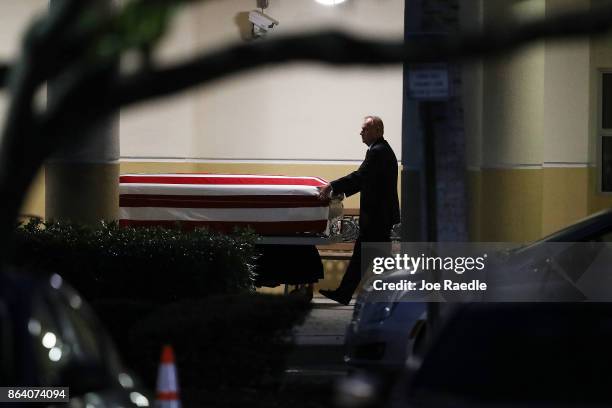 The casket of U.S. Army Sgt. La David Johnson is wheeled to the hearse after the viewing at the Christ the Rock Community Church on October 20, 2017...