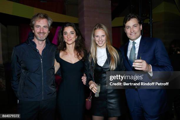 Lauren Ricard , her husband Gregoire Scholler , owner of "Beaux Arts magazine" Frederic Jousset and his wife Teodora attend the "Bal Jaune Elastique...