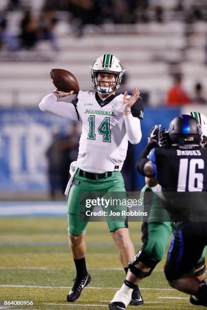 Chase Litton of the Marshall Thundering Herd throws a pass in the first quarter of a game against the Middle Tennessee Blue Raiders at Floyd Stadium...