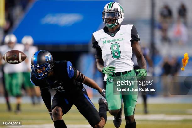 Tyre Brady of the Marshall Thundering Herd draws a pass interference penalty from Charvarius Ward of the Middle Tennessee Blue Raiders in the first...