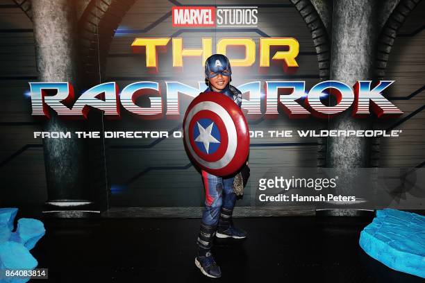 Fan poses at Marvel Studios Thor: Ragnarok booth at Armageddon on October 21, 2017 in Auckland, New Zealand.