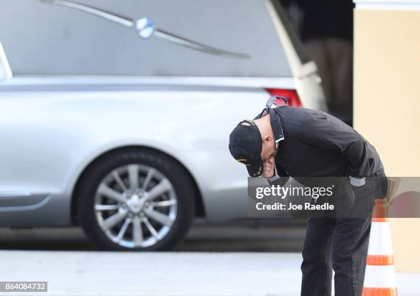 Mike Pacheco is overcome with emotion as he attends the viewing for U.S. Army Sgt. La David Johnson at the Christ the Rock Community Church on...