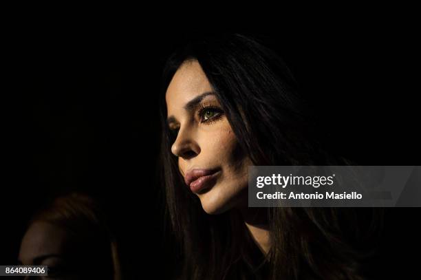 Nina Moric speaks with journalists during a meeting organized by far-right political movement Casapound to support, Luca Marsella, their candidate...