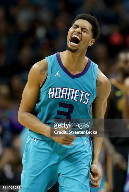 Jeremy Lamb of the Charlotte Hornets reacts after a play against the Atlanta Hawks during their game at Spectrum Center on October 20, 2017 in...