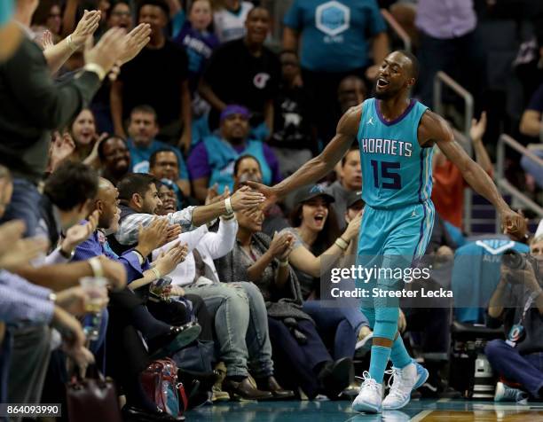 Kemba Walker of the Charlotte Hornets reacts after a shot against the Atlanta Hawks during their game at Spectrum Center on October 20, 2017 in...