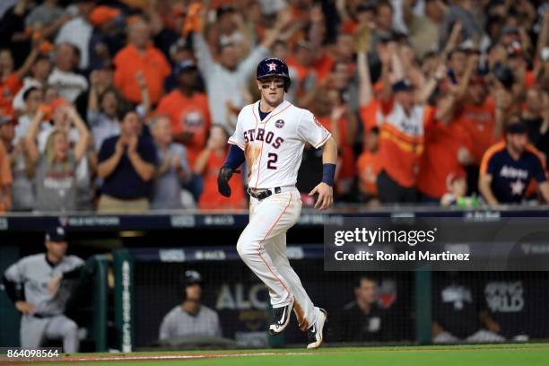 Alex Bregman of the Houston Astros celebrates after scoring off of Brian McCann RBI double against the New York Yankees during the fifth inning in...