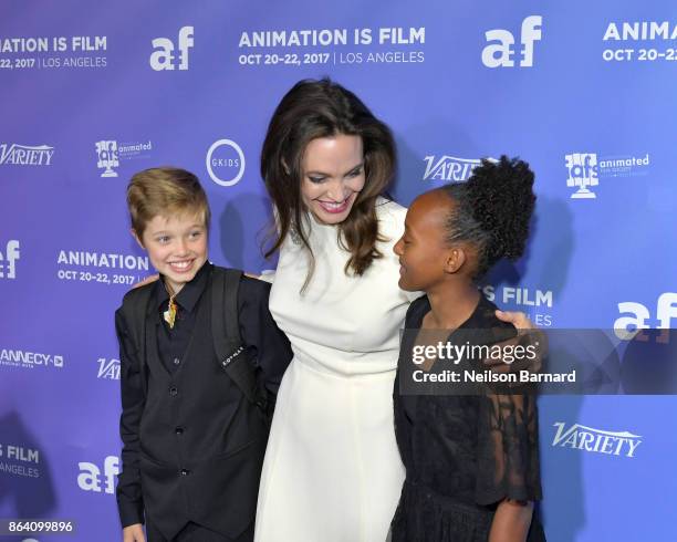 Shiloh Jolie-Pitt, Angelina Jolie and Zahara Jolie-Pitt attend the Premiere Of Gkids' "The Breadwinner" at TCL Chinese 6 Theatres on October 20, 2017...