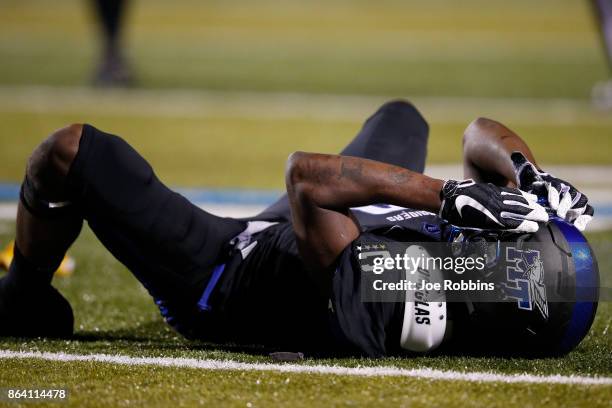 Richie James of the Middle Tennessee Blue Raiders reacts after being injured in the third quarter of a game against the Marshall Thundering Herd at...