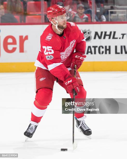 Mike Green of the Detroit Red Wings looks to make a pass during an NHL game against the Washington Capitals at Little Caesars Arena on October 20,...