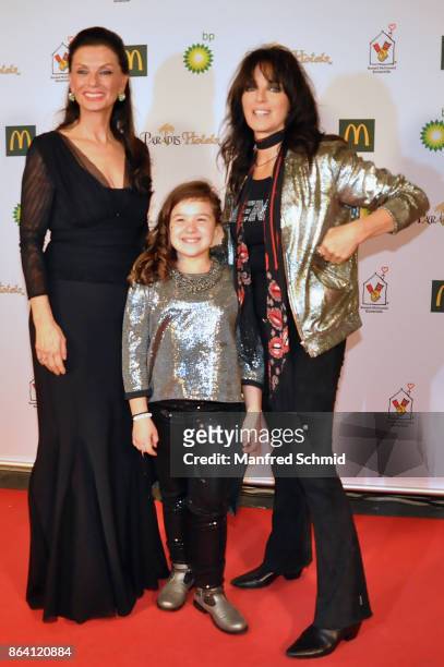 Sonja Klima, Pia Golueke and Nena pose during the Ronald McDonald Kinderhilfe charity event at Messe Wien on October 20, 2017 in Vienna, Austria.