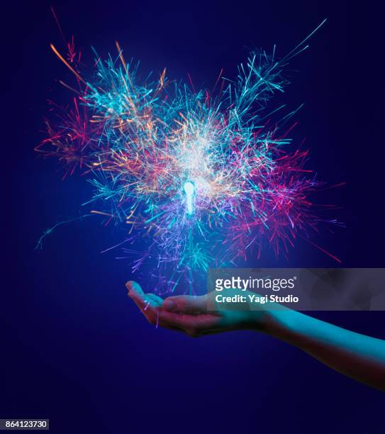 colorful hands and sparks - part of a series foto e immagini stock