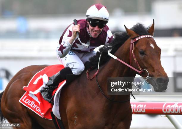 John Allen riding riding Cliff's Edge wins Race 4, Ladbokes Classic during Melbourne Racing on Caulfield Cup Day at Caulfield Racecourse on October...