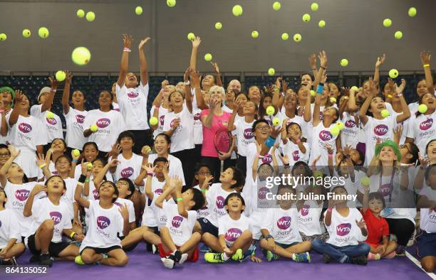 Judy Murray poses with children during Community Day prior to the BNP Paribas WTA Finals Singapore presented by SC Global at OCBC Arena on October...