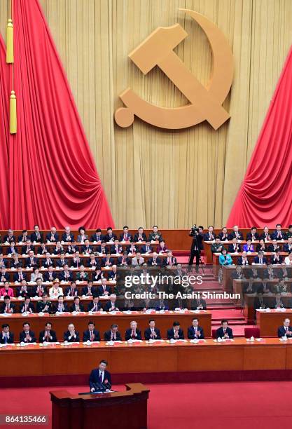 Chinese President Xi Jinping delivers a speech during the opening session of the 19th Communist Party Congress held at the Great Hall of the People...