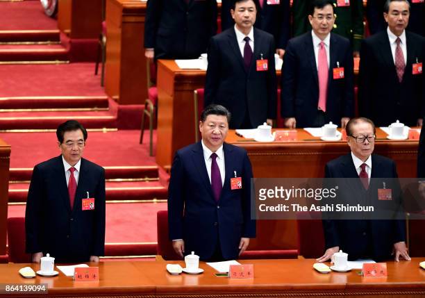 Chinese President Xi Jinping former presidents Hu Jintao and Jiang Zemin attend during the opening session of the 19th Communist Party Congress held...