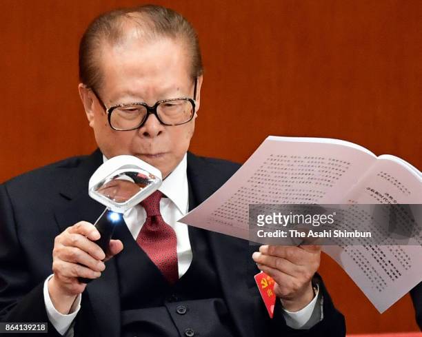 Former Chinese president Jiang Zemin attends during the opening session of the 19th Communist Party Congress held at the Great Hall of the People on...