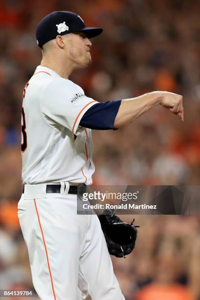 Ken Giles of the Houston Astros reacts after closing out the inning to defeat the New York Yankees with a score of 7 to 1 in Game Six of the American...