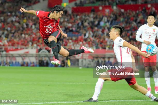 Shinzo Koroki of Urawa Red Diamonds heads the ball during the AFC Champions League semi final second leg match between Urawa Red Diamonds and...