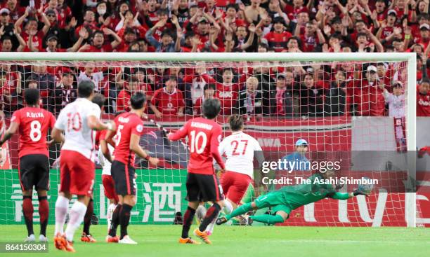 Shusaku Nishikawa of Urawa Red Diamonds makes a save during the AFC Champions League semi final second leg match between Urawa Red Diamonds and...