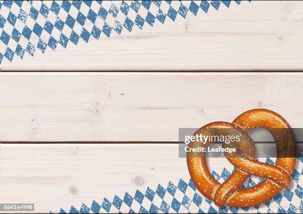 beer fest background [pretzel on the wooden boards] - oktoberfest stock illustrations