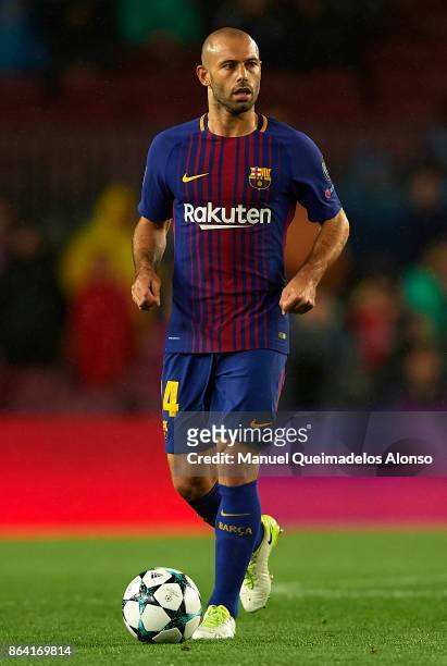 Javier Mascherano of Barcelona in action during the UEFA Champions League group D match between FC Barcelona and Olympiakos Piraeus at Camp Nou on...