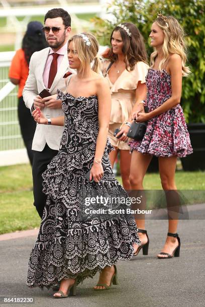 St Kilda Saints AFL player Paddy McCartin and Lucy Brownless attend Caulfield Cup Day at Caulfield Racecourse on October 21, 2017 in Melbourne,...