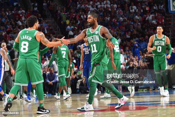 Kyrie Irving of the Boston Celtics shake hands during the game against the Philadelphia 76ers on October 20, 2017 at Wells Fargo Center in...