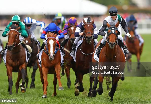 Jockey Cory Parish riding Boom Time celebrates as he wins race 8 The BMW Caulfield Cup during Caulfield Cup Day at Caulfield Racecourse on October...