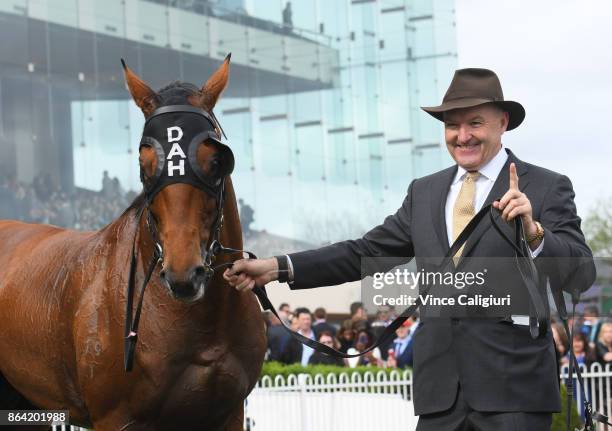 Trainer David Hayes poses with Boom Time after winning Race 8, Caulfield Cup during Melbourne Racing on Caulfield Cup Day at Caulfield Racecourse on...