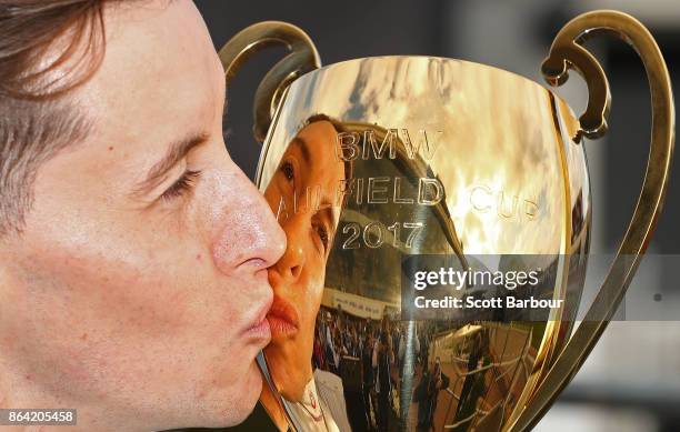 Jockey Cory Parish kisses the Caulfield Cup after riding Boom Time to win race 8 The BMW Caulfield Cup during Caulfield Cup Day at Caulfield...
