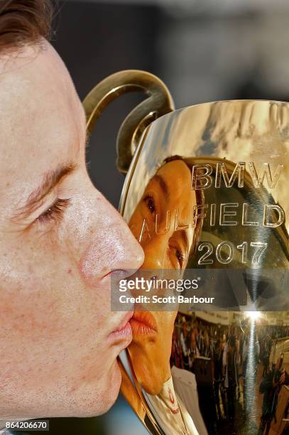 Jockey Cory Parish kisses the Caulfield Cup after riding Boom Time to win race 8 The BMW Caulfield Cup during Caulfield Cup Day at Caulfield...