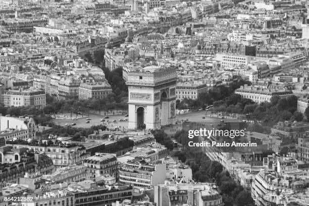 arc de triomphe and champs elysees in paris - arc de triomphe overview stock pictures, royalty-free photos & images