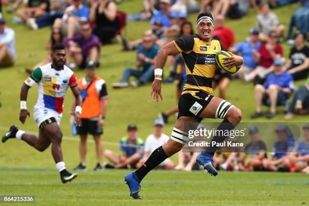 Richard Arnold of the Spirit runs the ball down thw wing during the round eight NRC match between Perth and the Sydney Rays at McGillivray Oval on...