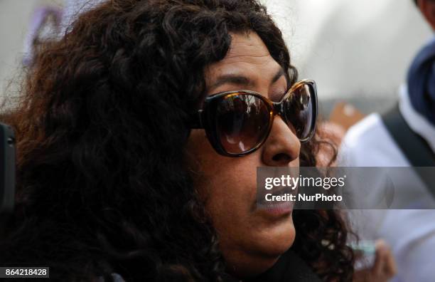 Liliana Alaniz, a complainant lawyer for a human rights organization, during the autopsy process of a body found on the same river where Santiago...