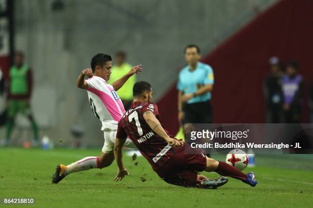 Nilton of Vissel Kobe and Yuji Ono of Sagan Tosu compete for the ball during the J.League J1 match between Vissel Kobe and Sagan Tosu at Noevir...
