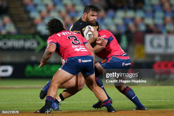 Angus Ta'avao of Taranaki is tackled during the Mitre 10 Cup Semi Final match between Taranaki and Tasman at Yarrow Stadium on October 21, 2017 in...