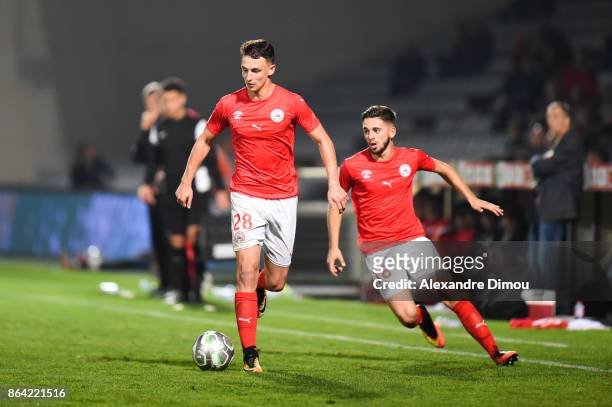 Olivier Boscagli and Theo Valls of Nimes during the Ligue 2 match between Nimes Olympique and Stade Brestois at on October 20, 2017 in Nimes, France.