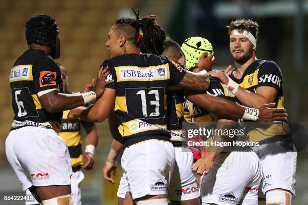 Charlie Ngatai of Taranaki celebrates with Pita Sowakula, Sean Wainui and Lachlan Boshier after scoring a try during the Mitre 10 Cup Semi Final...