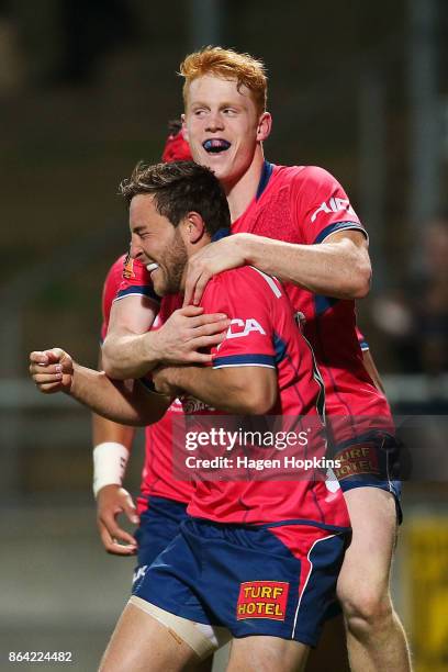Mitchell Hunt of Tasman celebrates with Finlay Christie after scoring a try during the Mitre 10 Cup Semi Final match between Taranaki and Tasman at...