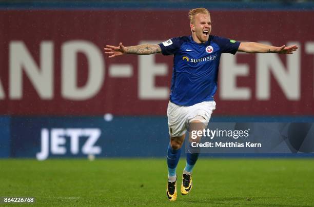 Marcel Hilssner of Rostock jubilates after scoring the second goal during the third league match between FC Hansa Rostock and VfL Osnabrueck at...