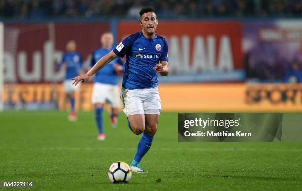 Mounir Bouziane of Rostock runs with the ball during the third league match between FC Hansa Rostock and VfL Osnabrueck at Ostseestadion on October...