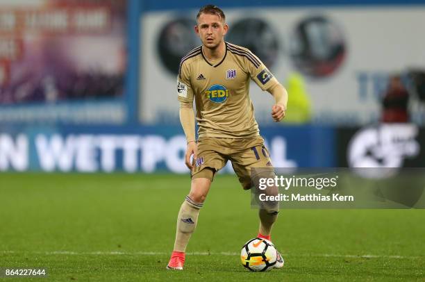 Marc Wachs of Osnabrueck runs with the ball during the third league match between FC Hansa Rostock and VfL Osnabrueck at Ostseestadion on October 20,...