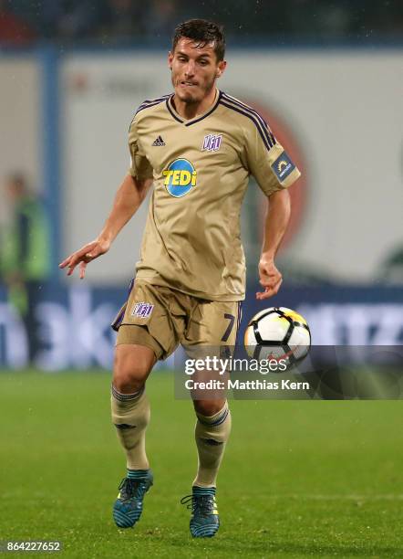 Bashkim Renneke of Osnabrueck runs with the ball during the third league match between FC Hansa Rostock and VfL Osnabrueck at Ostseestadion on...