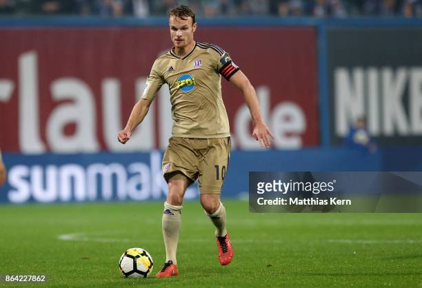 Christian Gross of Osnabrueck runs with the ball during the third league match between FC Hansa Rostock and VfL Osnabrueck at Ostseestadion on...